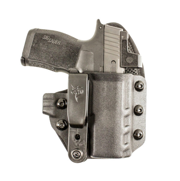 Concealed carry gun in black holster.