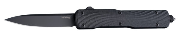 Black folding knife with textured handle