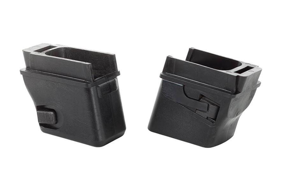 Two black plastic magazine speed loaders