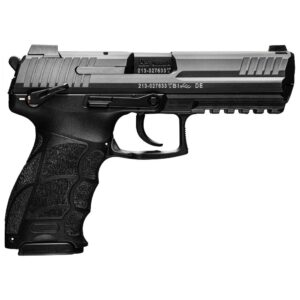 Black handgun side view isolated on white.