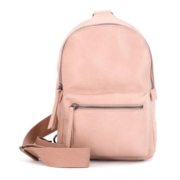 Pink leather backpack with front zipper pocket.