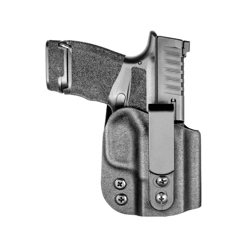 Holstered pistol side view isolated on white background.