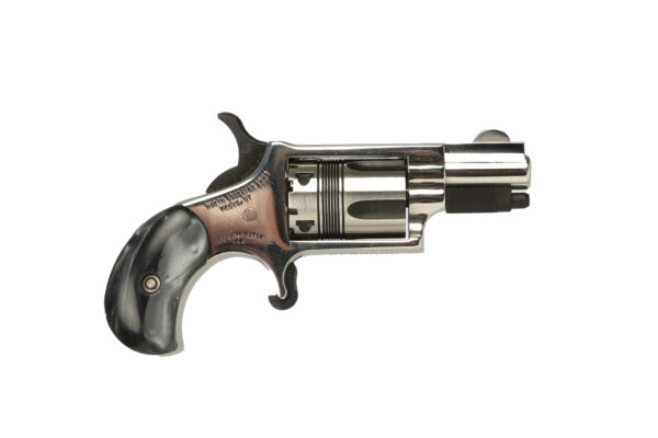 Chrome revolver with black handle, side view.