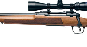 Wooden hunting rifle with scope on white background.
