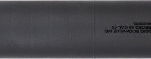 Black firearm suppressor with manufacturer details