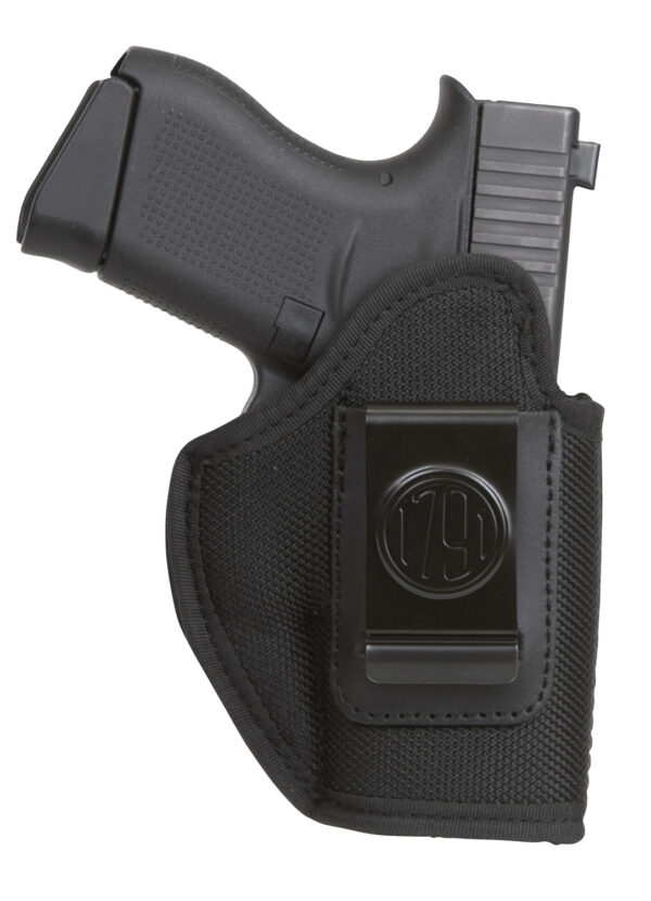 Black handgun in a holster