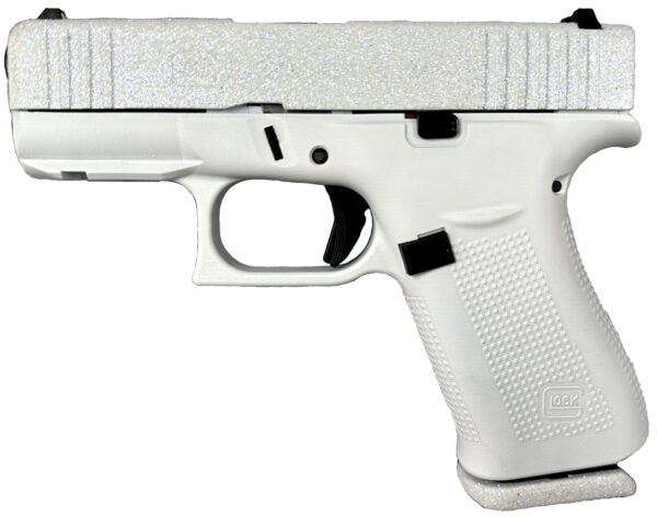White handgun with textured grip and slide.