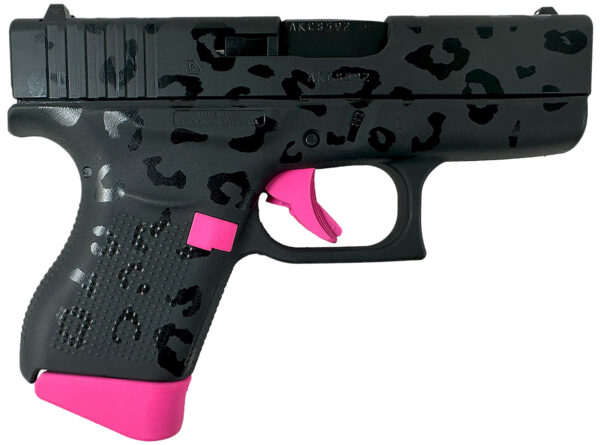 Stylish pink and black patterned handgun.
