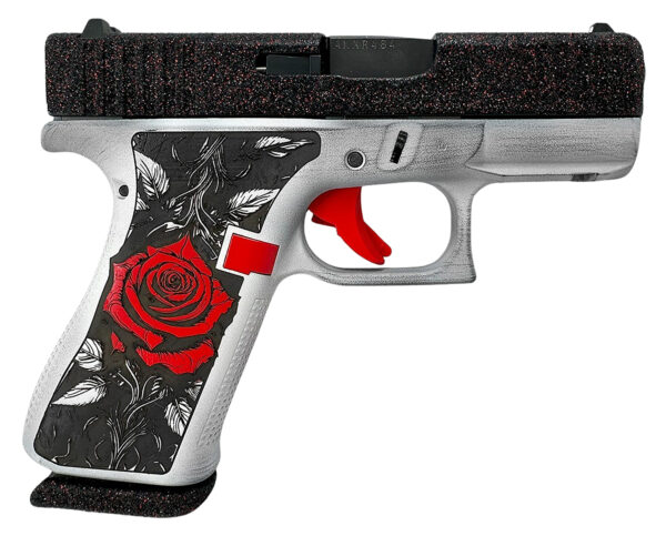 Gun adorned with red rose design