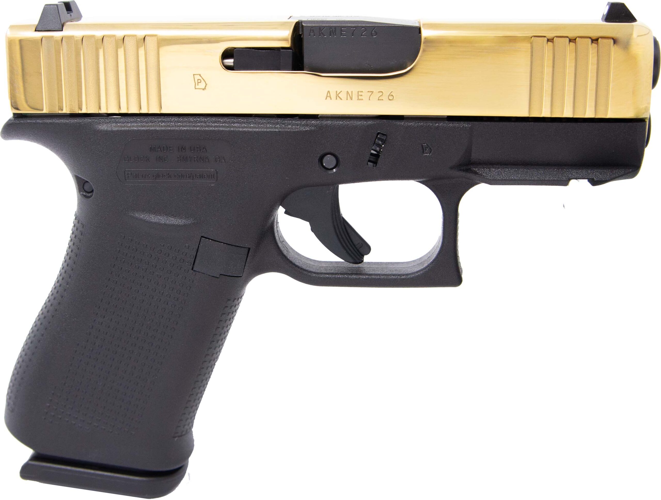 Gold and black semi-automatic handgun from the side.