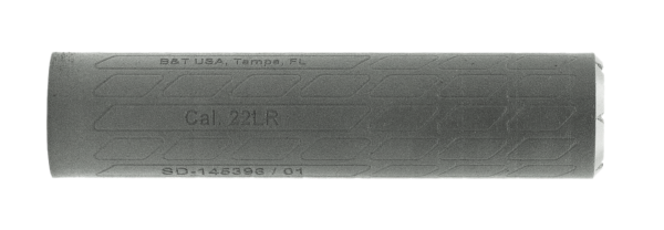Close-up of a gray firearm suppressor.