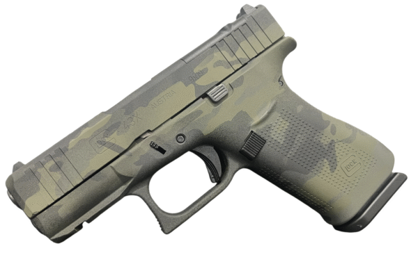 Glock 43X handgun in camouflage pattern.