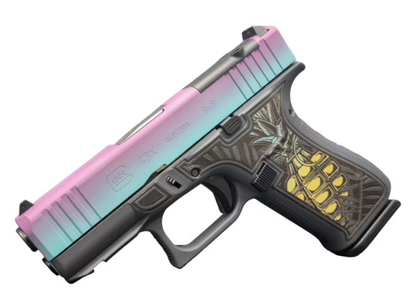 Stylish handgun with colorful pineapple design.