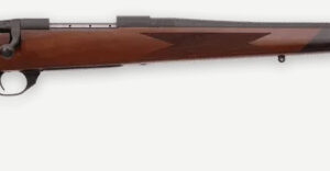 Side view of a wooden rifle with long barrel.