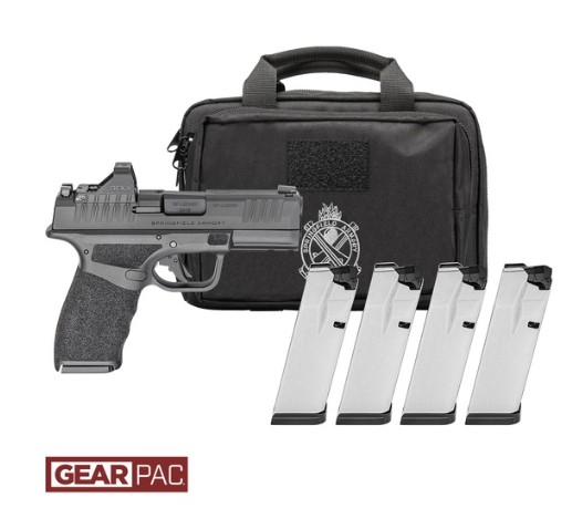 Handgun with four magazines and a carrying case.
