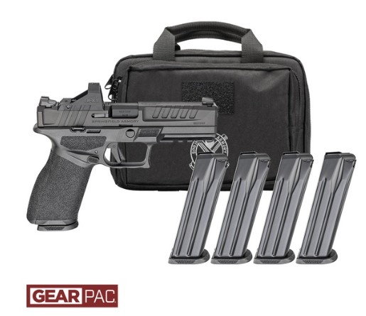 Handgun with four magazines and carrying case.