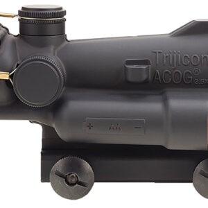 Trijicon ACOG rifle scope with mounting hardware.