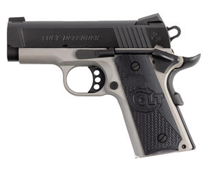 Colt Defender handgun with black and silver finish.
