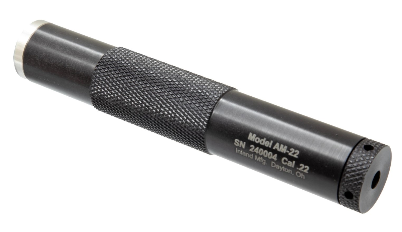 Close-up of a black firearm suppressor.