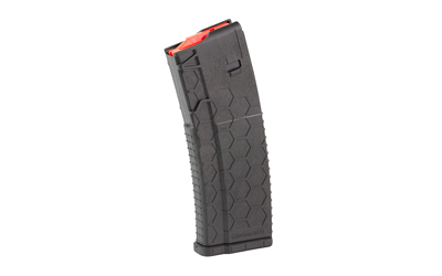Black magazine with hexagonal grip pattern.