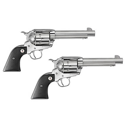 Two silver revolvers with black grips.