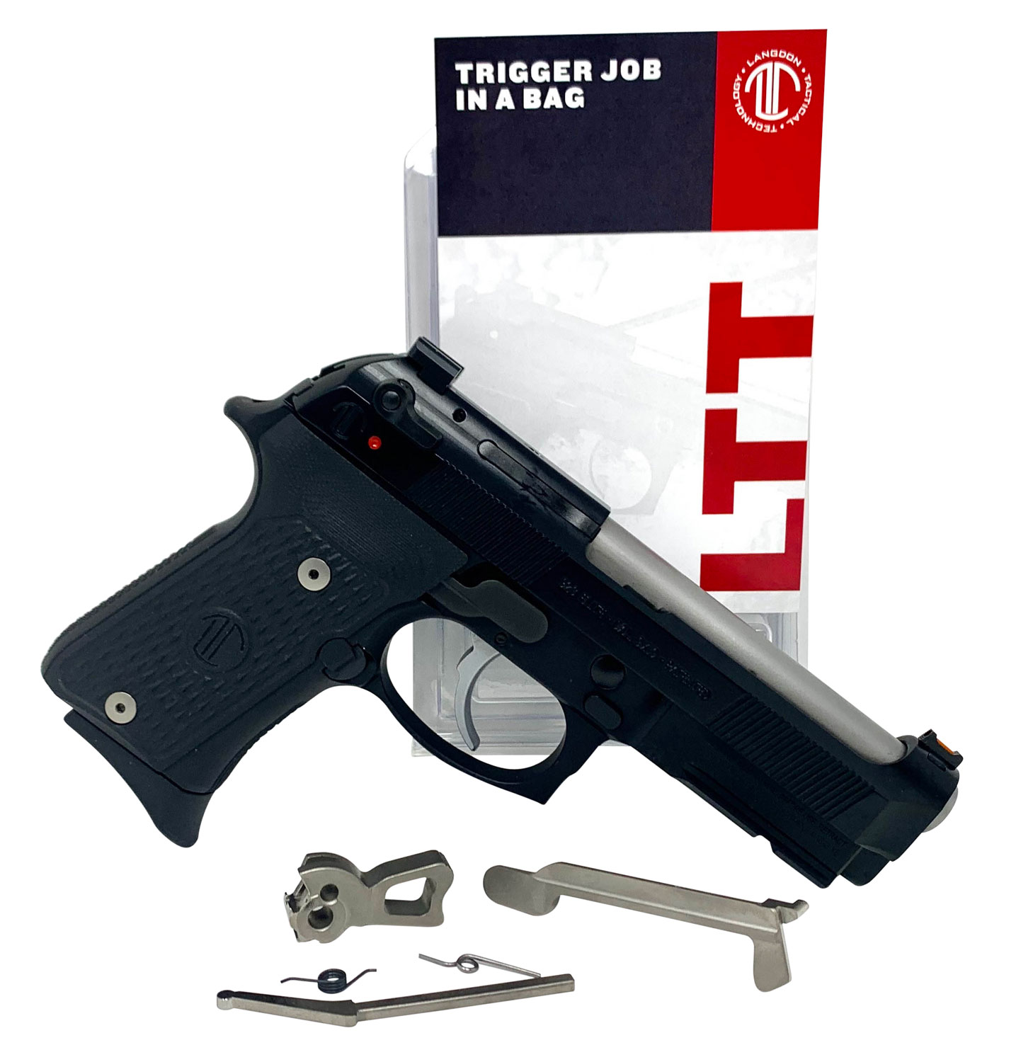 Black handgun with accessories and packaging.