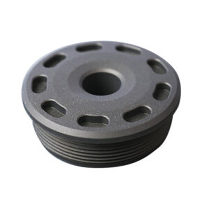 Round metallic component with circular holes