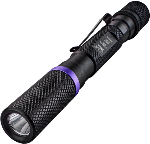 Compact black flashlight with textured grip