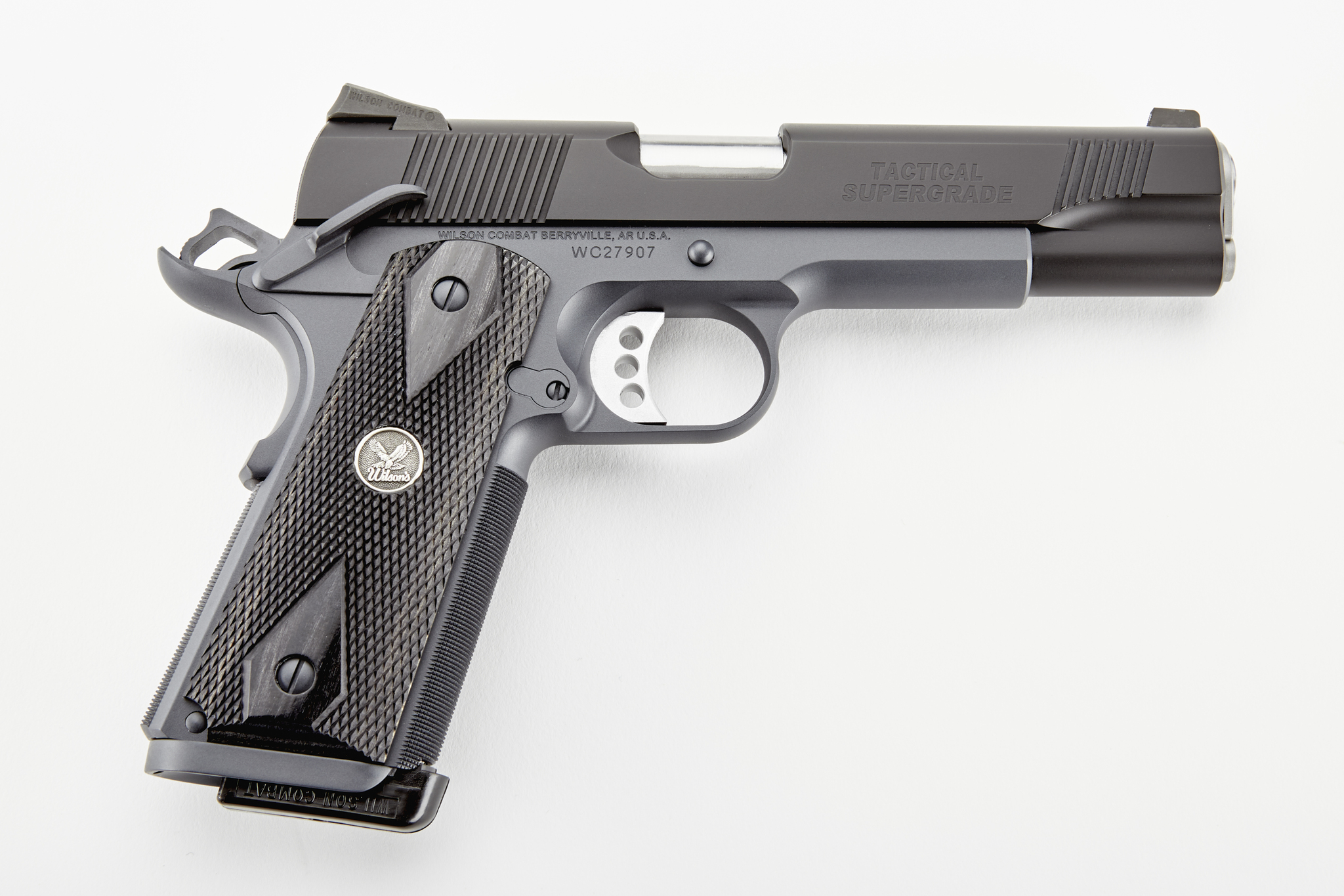 Black tactical handgun on white background.