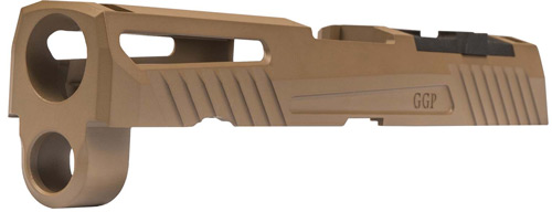 Tan firearm slide with ergonomic design features.
