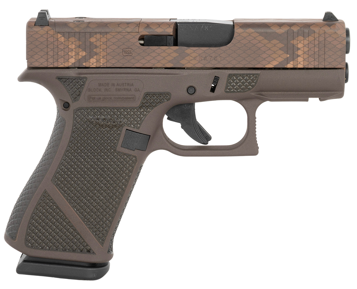 Side view of a brown patterned handgun.