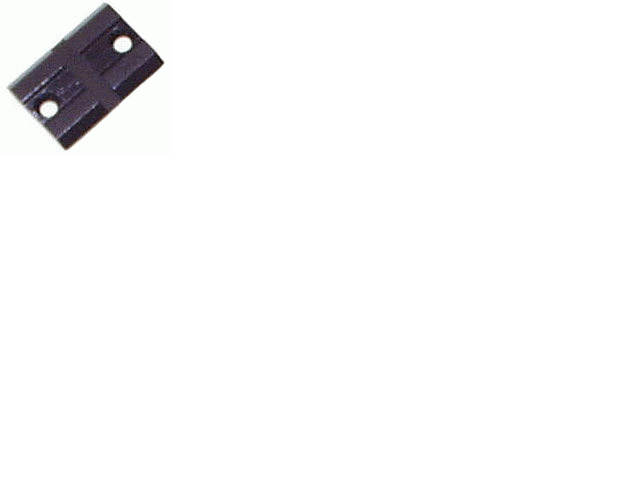 Black rectangular object with two circular holes.