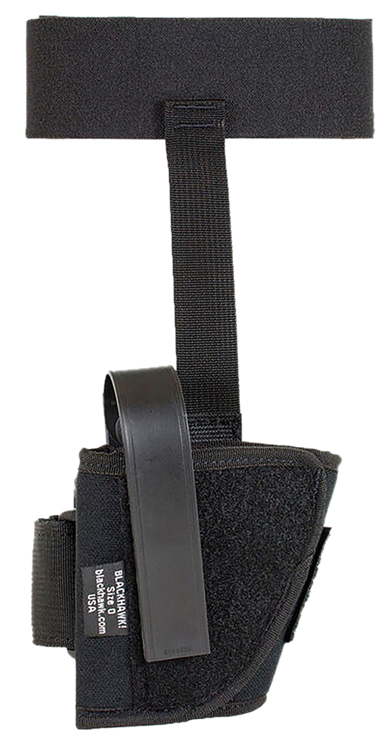 Black tactical holster for firearms and accessories.