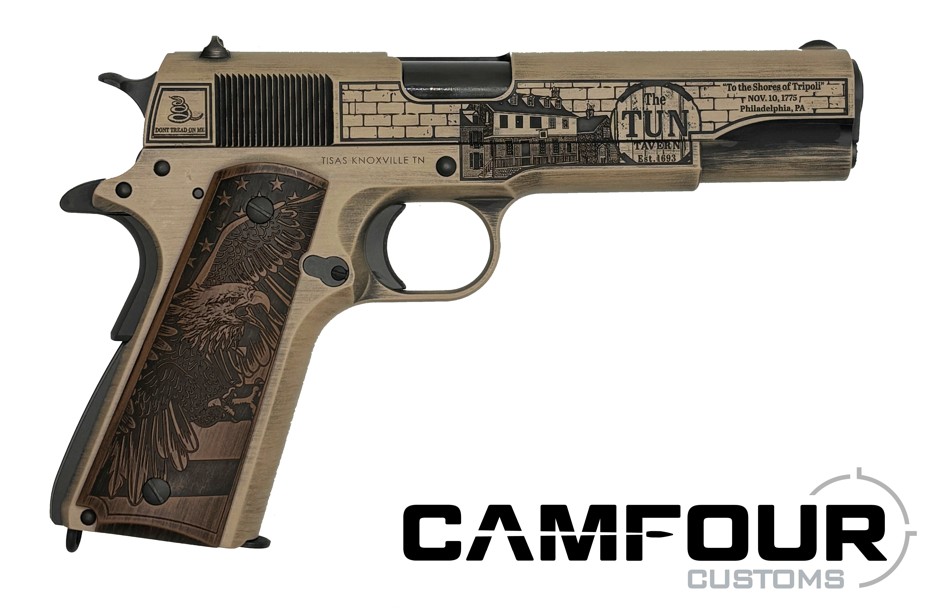 Engraved custom firearm featuring eagle and historical design.