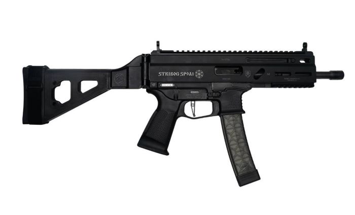 Black firearm with ergonomic design and magazine