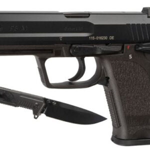 Handgun with a knife beside it