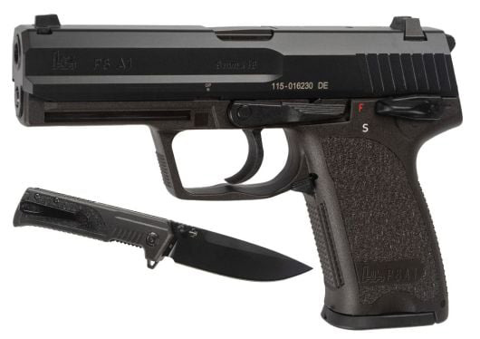 Handgun with a knife beside it