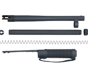 Disassembled firearm components laid out separately.