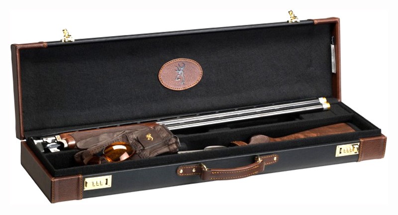 Open case containing a firearm and accessories.