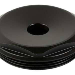 Black mechanical component with central hole