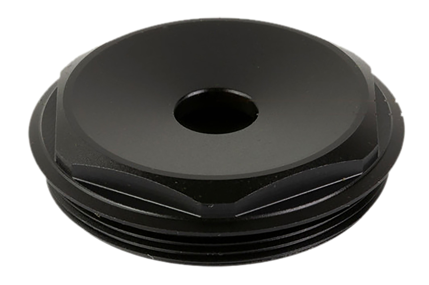 Black mechanical component with central hole