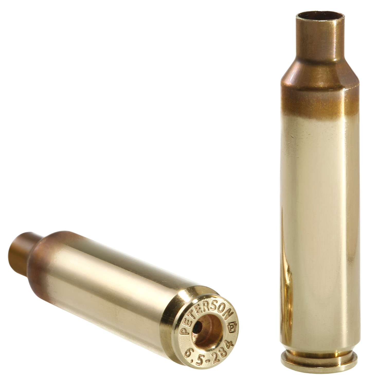 Two brass rifle cartridge casings on white background.