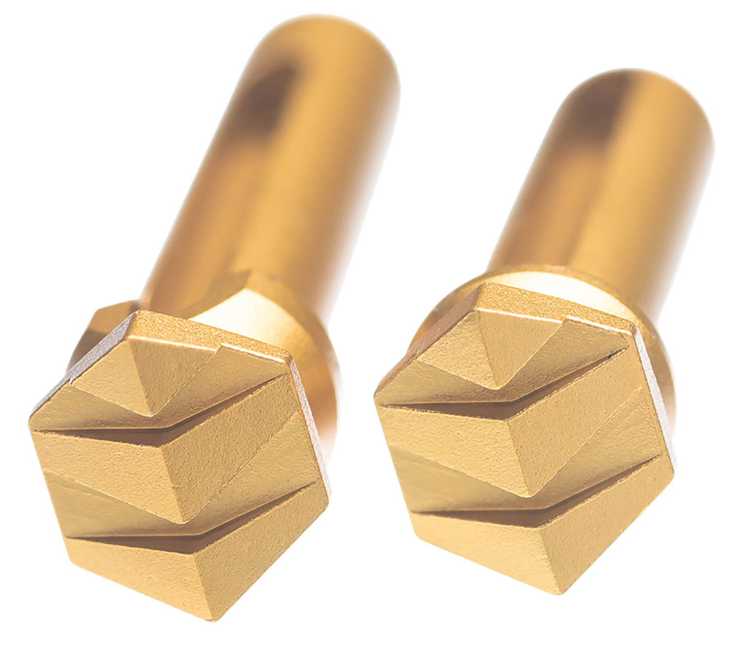 Two golden hexagonal metal tools.
