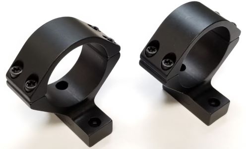 Two black firearm scope rings with screws.