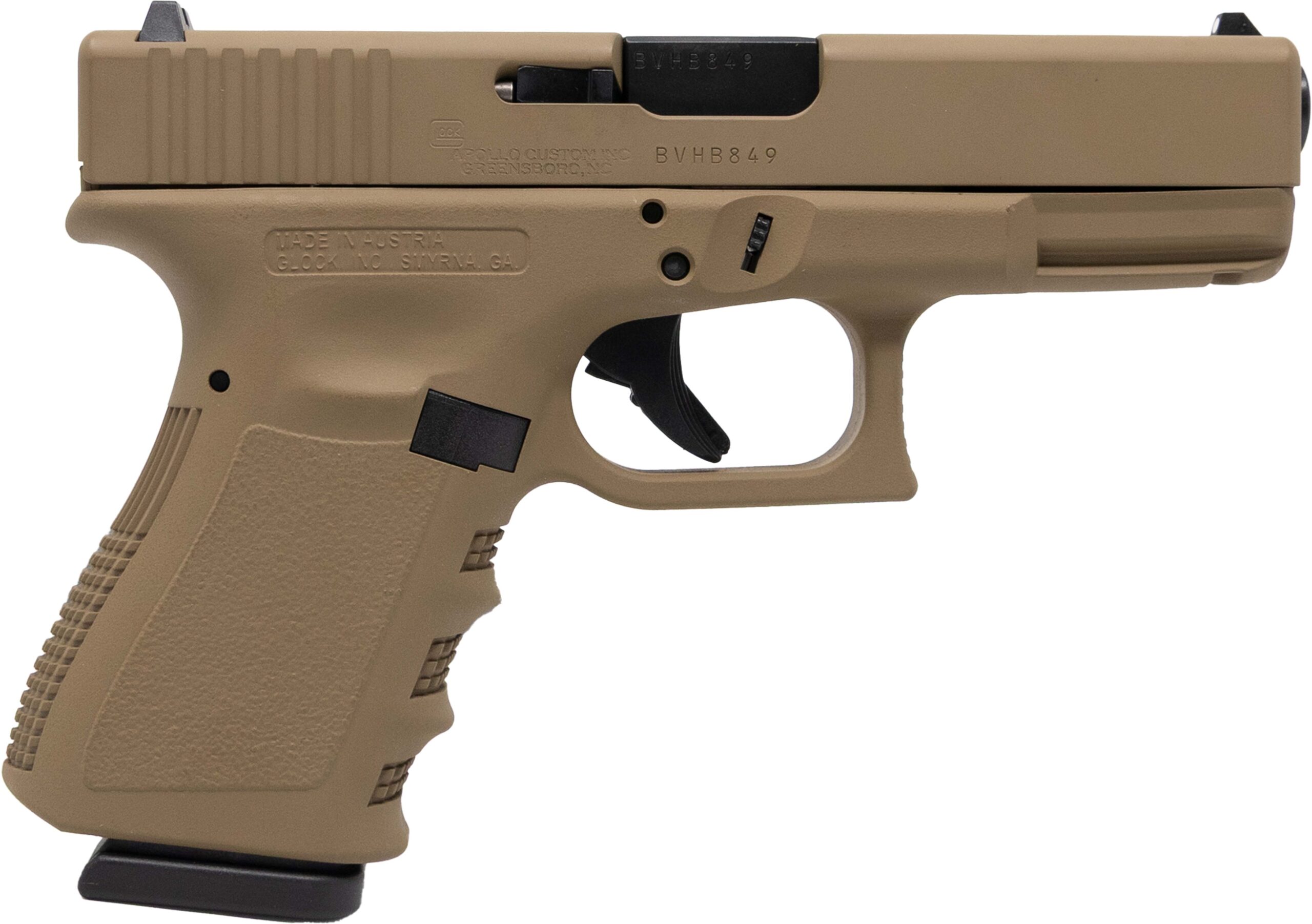 Tan handgun with textured grip and magazine