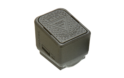 Black square electrical connector with textured surface.