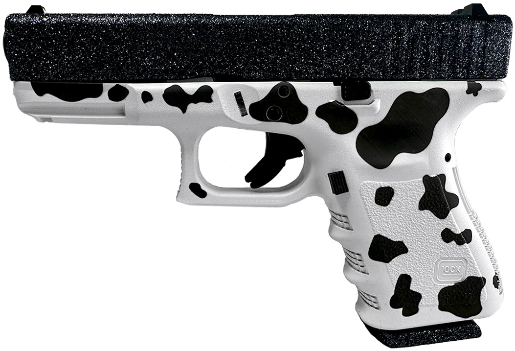Glock handgun with cow print design.