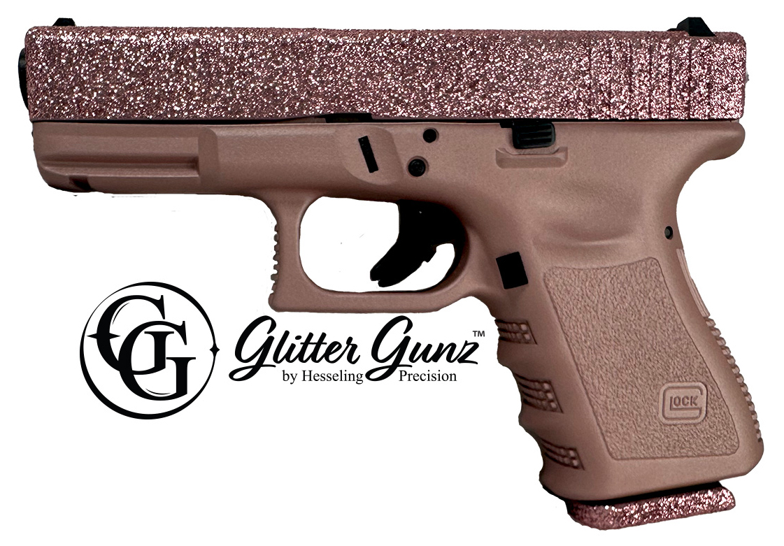 Decorative pink handgun with glitter finish.