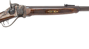 Vintage wooden rifle with ornate detailing.