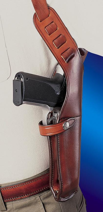 Handgun in a brown leather holster